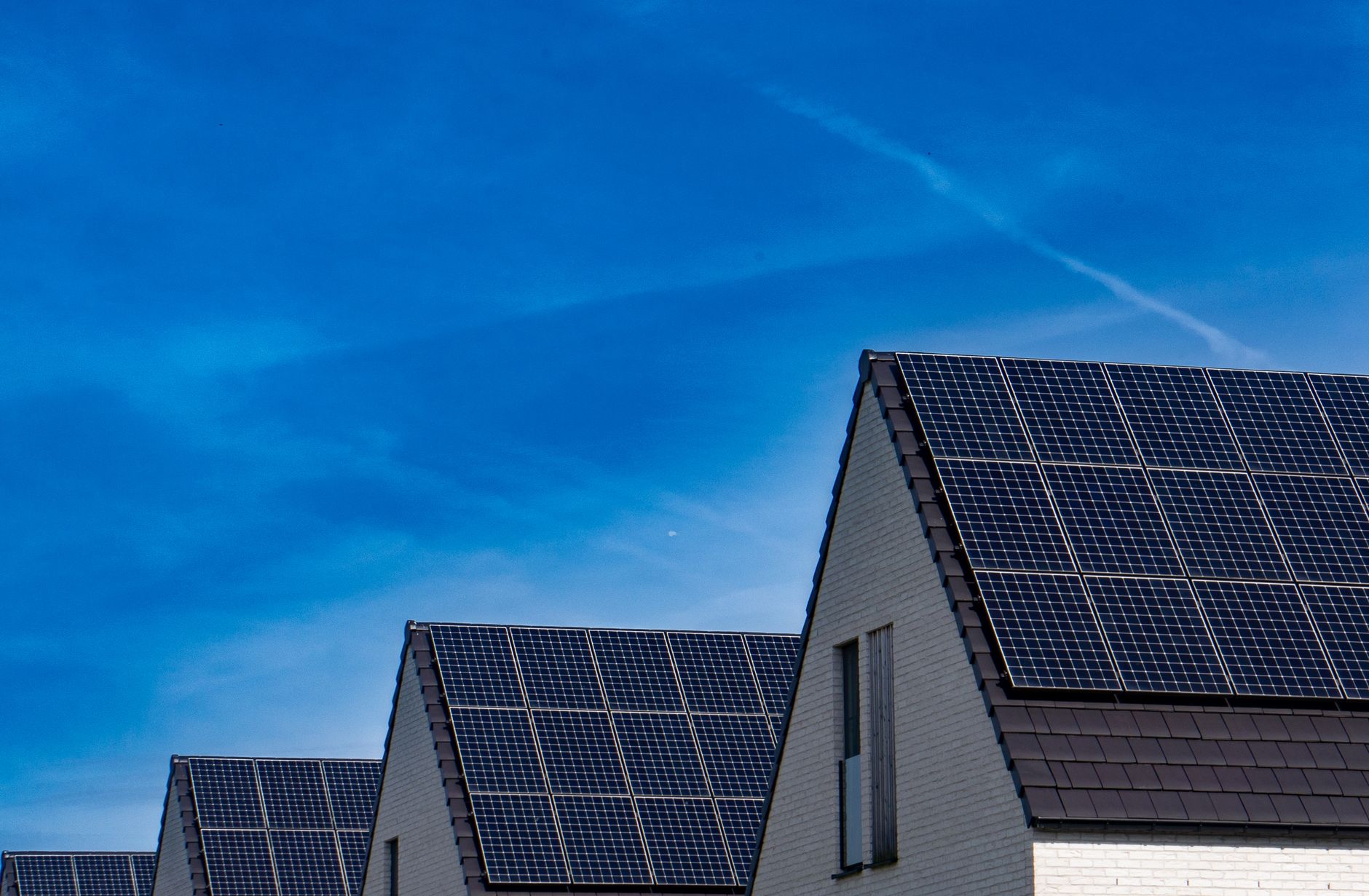 A modern spacious residential area with integrated green power grids and solar roof systems