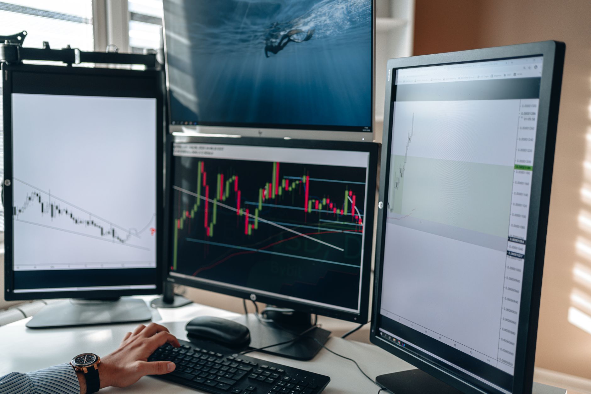 A business designer analyzing dynamic charts on screen